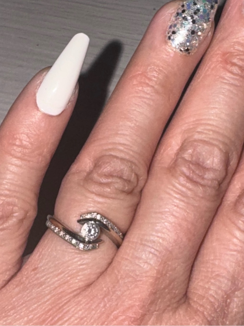 14KT White gold Swirl Diamond Ring